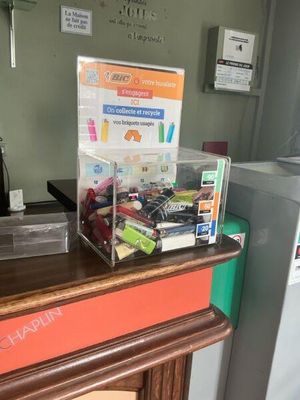 a counter that has a bunch of items on top of it
