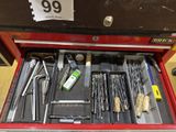 a red tool box with many tools in it