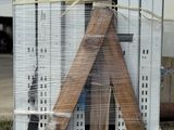 a pile of metal and wood items on the ground