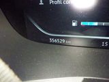 the dashboard of a car with a digital display showing the speed of a car