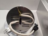 a white box with a black and yellow wire attached to it and a white box with a black and yellow wire attached to it