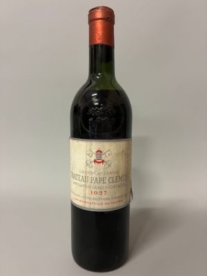 a bottle of wine that is sitting on a table