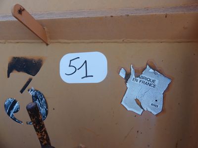 a sticker on the side of a box that has a number 54 on it