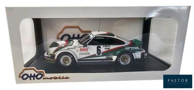 toy model of a white car in a white box with a green and red stripe