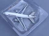 a plastic container with a model of a plane in it