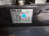 a close up of a sewing machine with a label on it