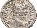 a silver coin with an image of a man on it