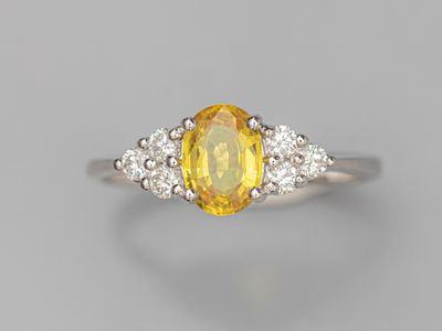 Bague en or gris 750°/°° (18K), sertie d'un saphir jaune tai… - Photo 1
