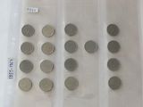 a lot of coins in a plastic bag on a table
