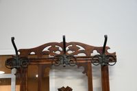 Vestiaire en bois teinté foncé d'un miroir losangique à patè… (photo 6)