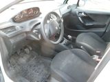 a picture of a small car with a steering wheel and dashboard