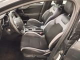 a picture of a car that is sitting in a room