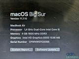 an image of a close up of a computer screen with the macos big sur logo on it
