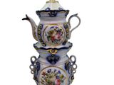 three teapots stacked on top of each other on a table