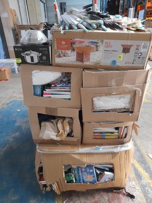 many boxes stacked on top of each other on the floor