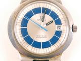 a silver watch with a blue face on a white background