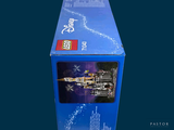 a blue box with a lego castle inside of it