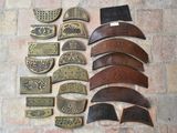 a lot of different pieces of leather on the floor