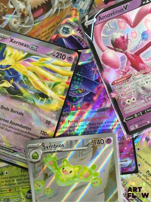 a lot of pokemon cards that are on the table
