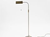 a metal floor lamp with a wooden shade on top of it