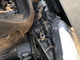 a close up of a motorcycle that has been burnt