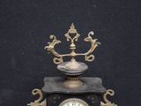 a clock that is sitting on top of a table