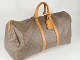 louis vuitton keepall bag in monogram canvas and leather