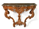 a table with a marble top and a wooden base