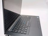 a laptop that is open and sitting on a table