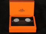 an image of a pair of cuff watches in an orange box