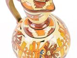 an image of a vase with a decorative design on it