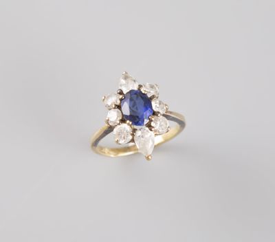 une bague à grappes de saphirs et de diamants