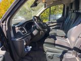 the interior of a vehicle with the driver ' s seat up