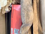 a cardboard box with a book inside of it