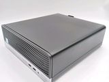 an image of a black computer sitting on top of a white surface