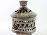 a small lamp that is sitting on a table
