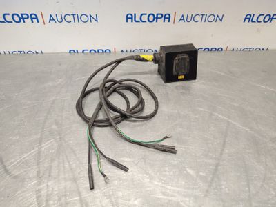 a picture of an electrical device with wires attached to it
