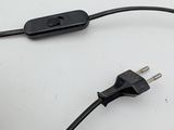 a black cord that is connected to a computer mouse