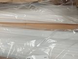 two pieces of plastic wrapped up in a box