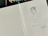 a book with a drawing of a man on it