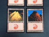 four cards with a picture of a mountain and a fox on them