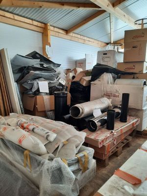 a room filled with lots of boxes and other items