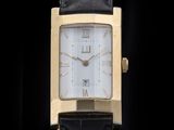 an image of a close up of a watch on a black background