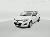 a white car is parked in a white room