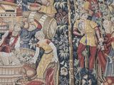 a tapestry with a picture of a man and a woman on it