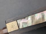 a close up of a piece of wood with a piece of aba aba aba aba aba aba aba aba aba aba aba aba aba aba aba aba aba aba