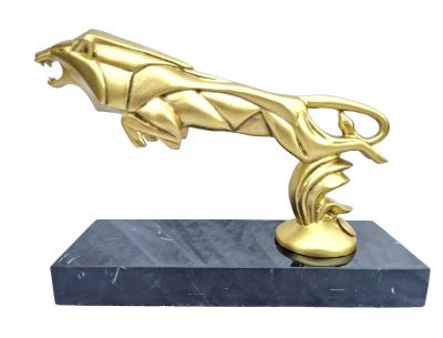statue of a gold panther on a marble base