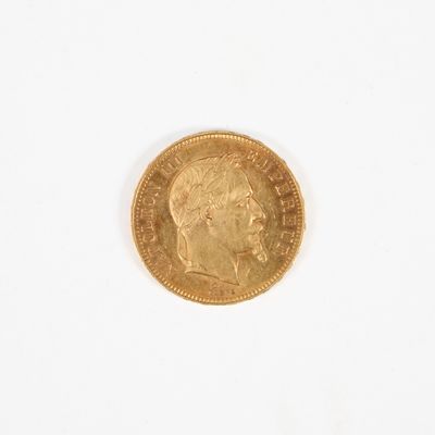 une image d'une pièce d'or sur une surface blanche