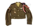 an image of a military jacket with medals and ribbons on it