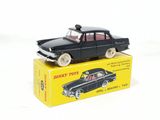 a black toy car sitting on top of a yellow box